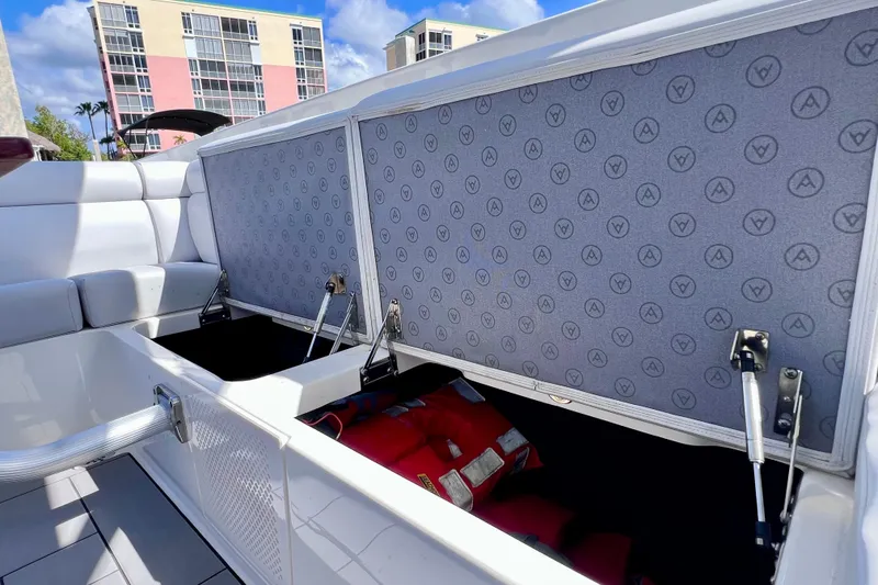 Slide: The Image of 2023 Aviara AV36 OB boat interior with luxurious seating and cup holders. - 55