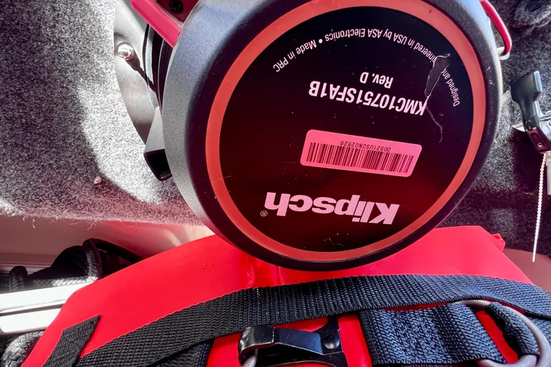 Slide: The Image of 2023 Aviara AV36 OB boat interior with white cushioned seating and cup holders. - 56