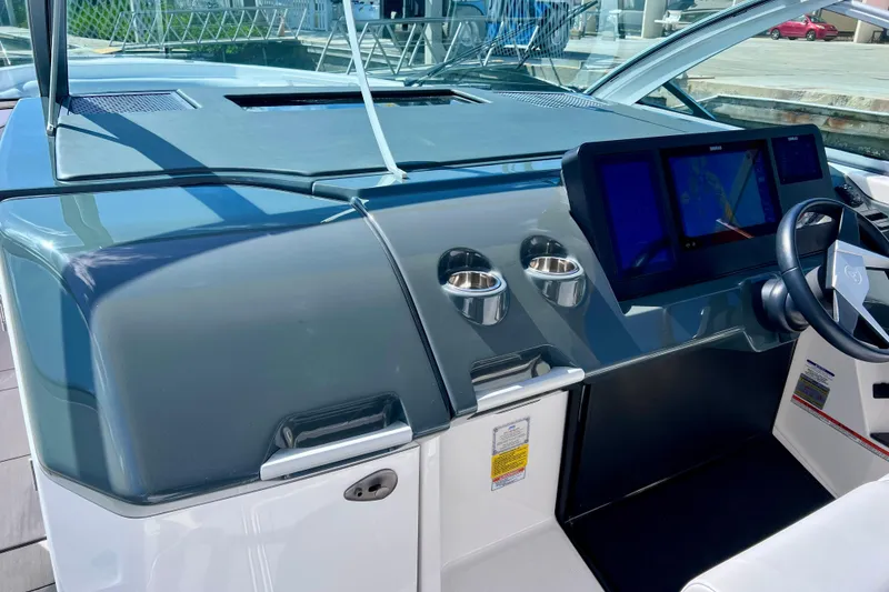 Slide: The Image of 2023 Aviara AV36 OB interior detail with speaker grille and control panel. - 58