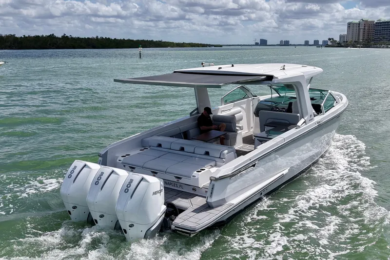 Slide: The Image of 2023 Aviara AV36 OB luxury boat cruising on a sunny day. - 7