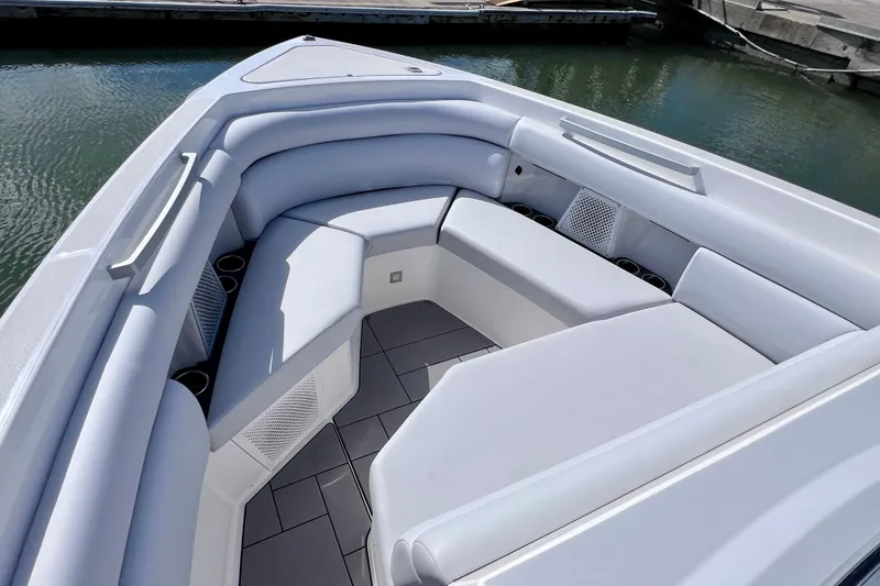 Slide: The Image of 2023 Aviara AV36 OB boat interior with seating and control panel. - 72