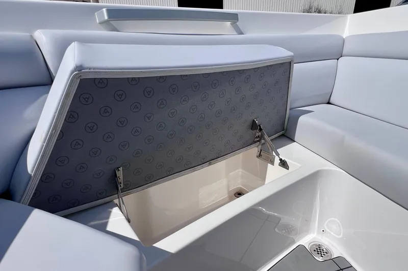 Slide: The Image of 2023 Aviara AV36 OB boat with open storage compartment at marina. - 74