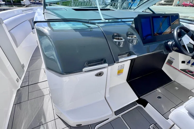 Slide: The Image of 2023 Aviara AV36 OB boat storage compartment with fenders and ropes. - 78