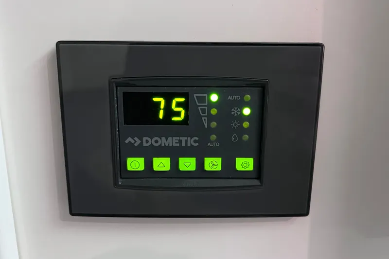 Slide: The Image of Navigation display on 2023 Aviara AV36 OB showing map and vessel controls. - 83