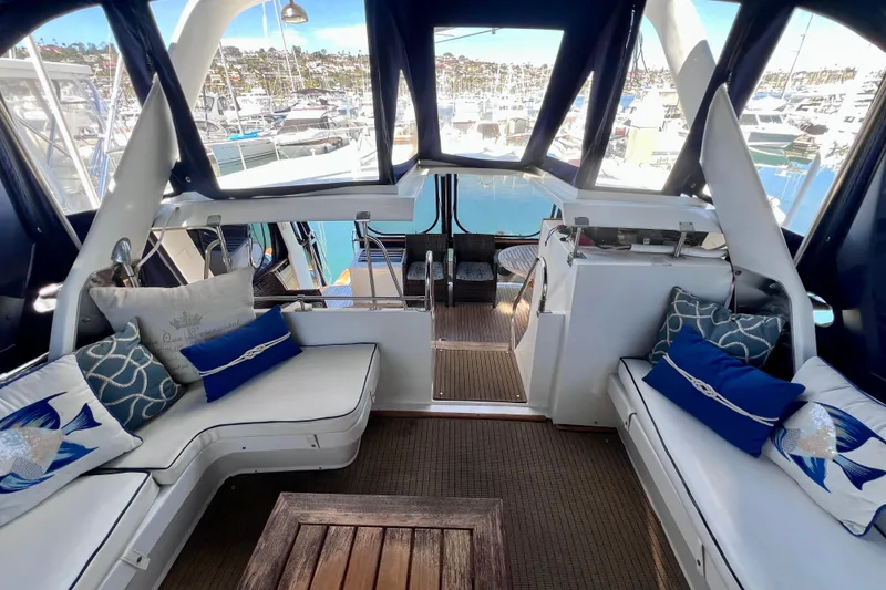 Slide: The Image of Luxurious 1984 Kha Shing Spoiler Cockpit Motor Yacht interior with elegant seating and nautical decor. - 5