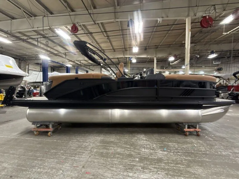 The Image of 2026 Bennington 22MFB pontoon boat in a warehouse. - 1
