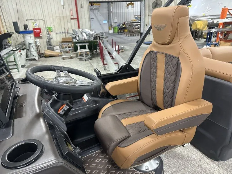 Slide: The Image of Luxurious driver's seat in Bennington 22MFB boat, year 2026. - 13