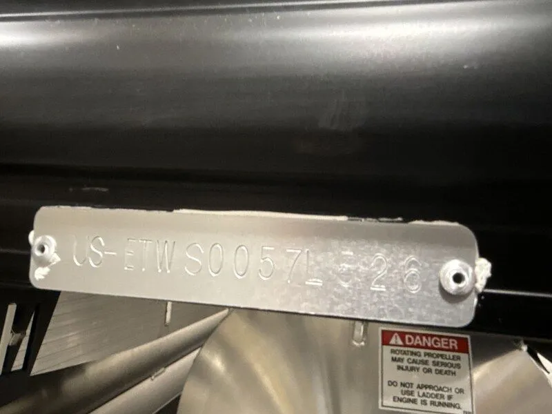 Slide: The Image of Bennington 22MFB 2026 serial number plate with warning label. - 21