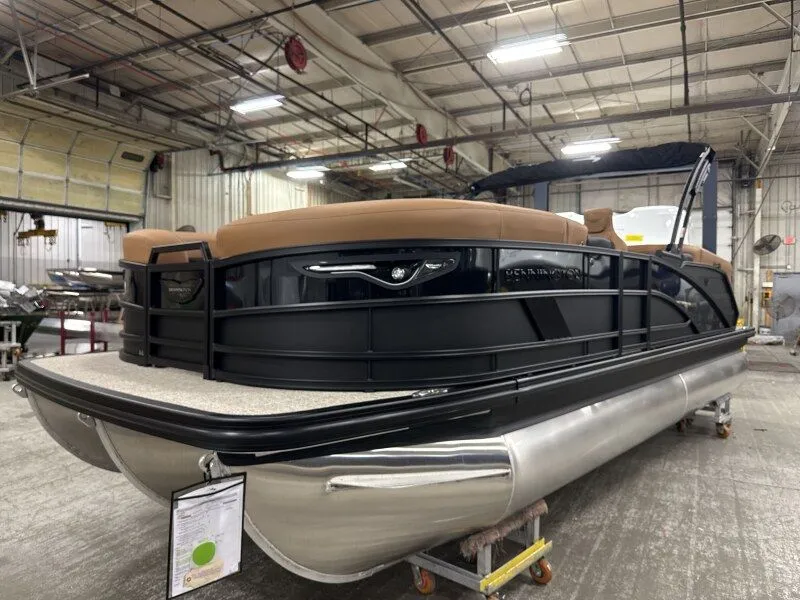 Slide: The Image of 2026 Bennington 22MFB pontoon boat in a workshop. - 4