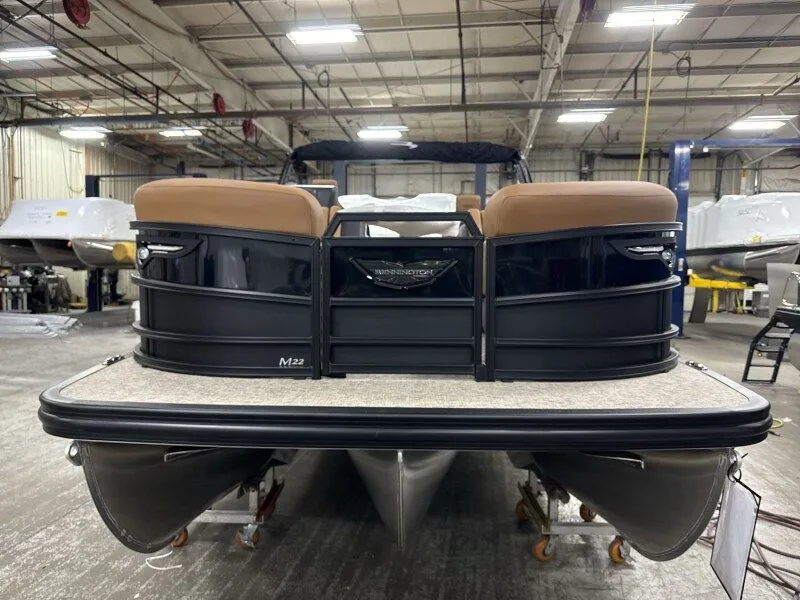 Slide: The Image of Bennington 22MFB 2026 pontoon boat in a warehouse. - 5