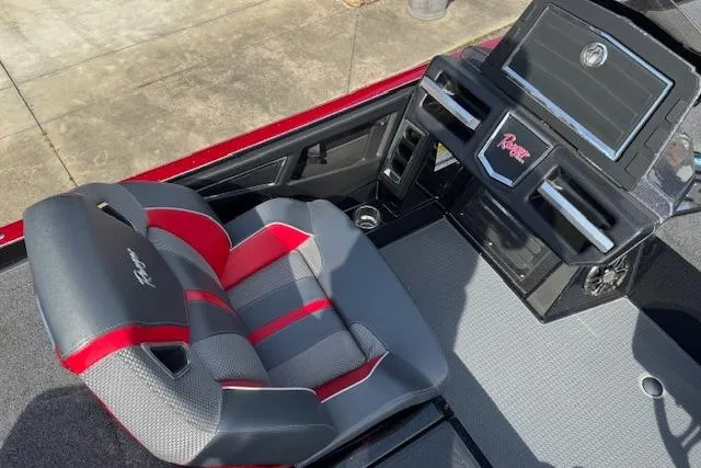 Slide: The Image of 2022 Ranger Z520R Cup-Equipped boat interior with red and gray seating. - 11
