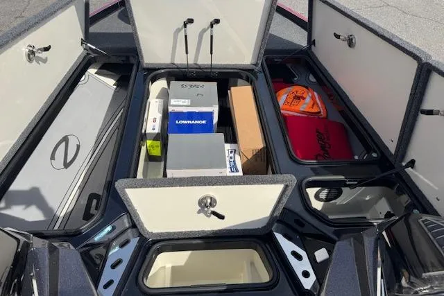 Slide: The Image of Open storage compartments in a 2022 Ranger Z520R Cup-Equipped boat, showcasing organized equipment and gear. - 13