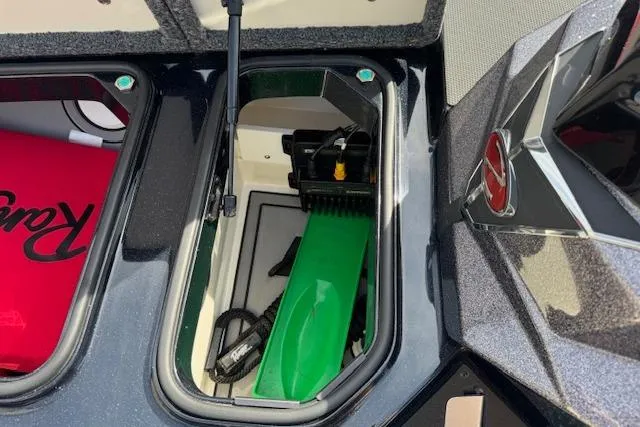 Slide: The Image of 2022 Ranger Z520R Cup-Equipped boat storage compartments with green accessory and red Ranger logo. - 17