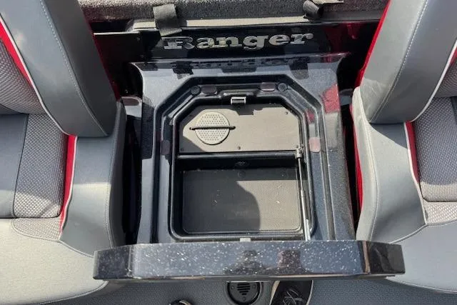 Slide: The Image of 2022 Ranger Z520R Cup-Equipped boat interior with storage compartment open. - 19