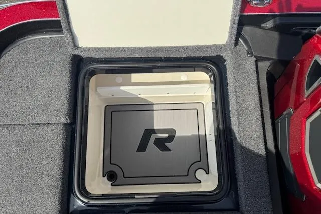 Slide: The Image of 2022 Ranger Z520R Cup-Equipped storage compartment with logo, open lid, and carpeted interior. - 23