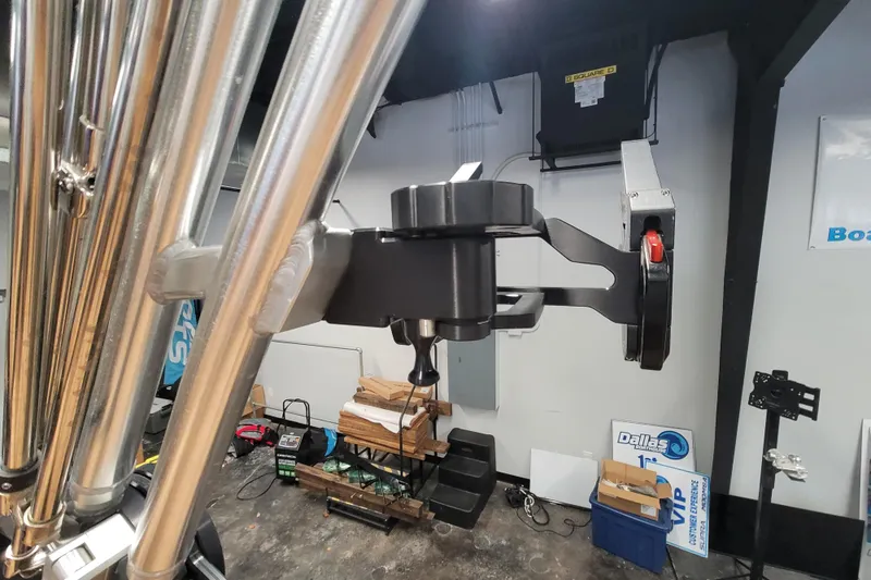 Slide: The Image of Close-up of 2025 MasterCraft NXT23 boat accessory in a workshop setting. - 14