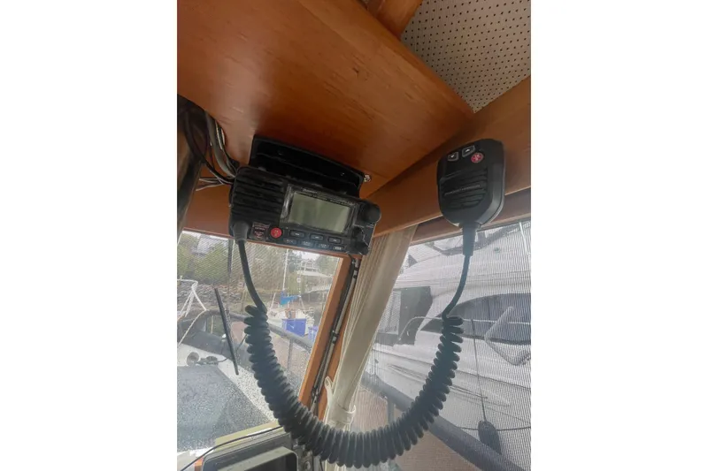 Slide: The Image of VHF radio equipment inside 1984 Grand Banks 32 Sedan boat cabin. - 14