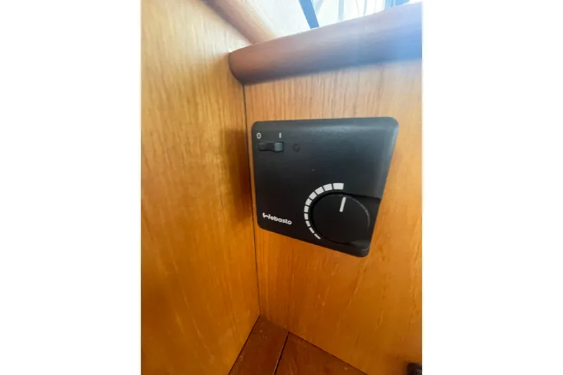 Slide: The Image of Control panel on 1984 Grand Banks 32 Sedan boat, featuring a Webasto dial. - 20