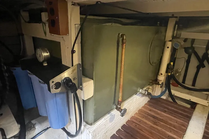 Slide: The Image of Engine room of 1984 Grand Banks 32 Sedan with fuel tank and gauges. - 27