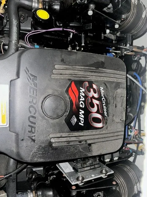 Slide: The Image of MerCruiser 350 MAG MPI engine in a 2006 Crownline 266. - 13