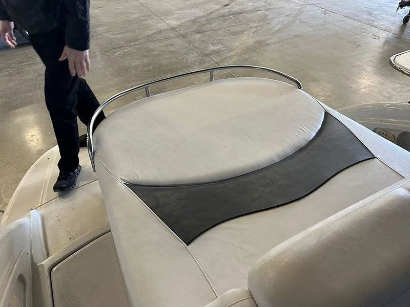 Slide: The Image of Crownline 316 LS 2005 boat with cushioned seating area. - 10