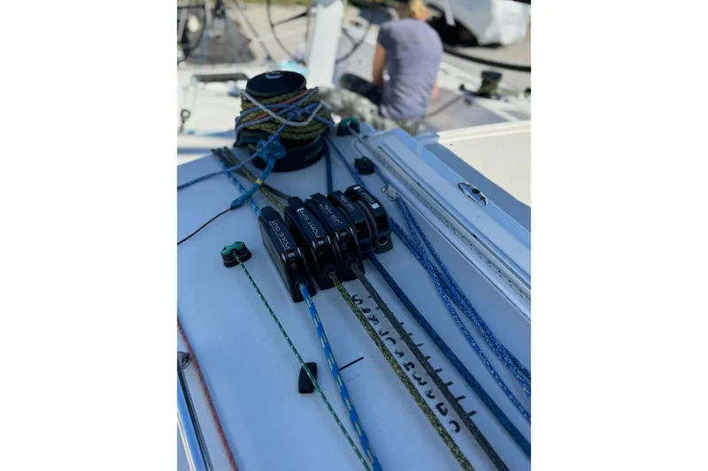 Slide: The Image of 2019 J Boats J/121 sailboat deck with ropes and winches in focus. - 28