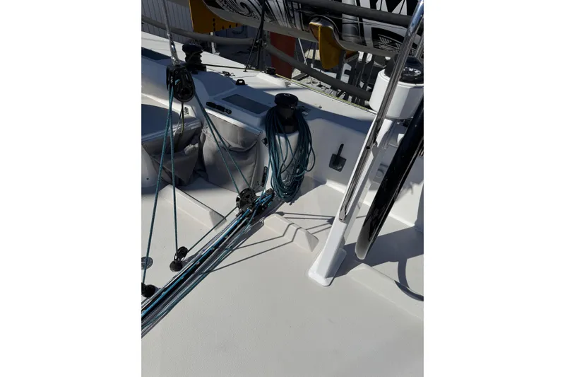 Slide: The Image of 2019 J Boats J/121 sailboat deck with rigging and steering wheel. - 30