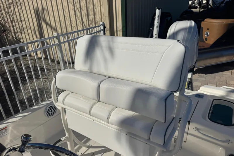 Slide: The Image of White seating on 2026 Skeeter SX221 boat, featuring sleek design and comfortable cushions. - 15