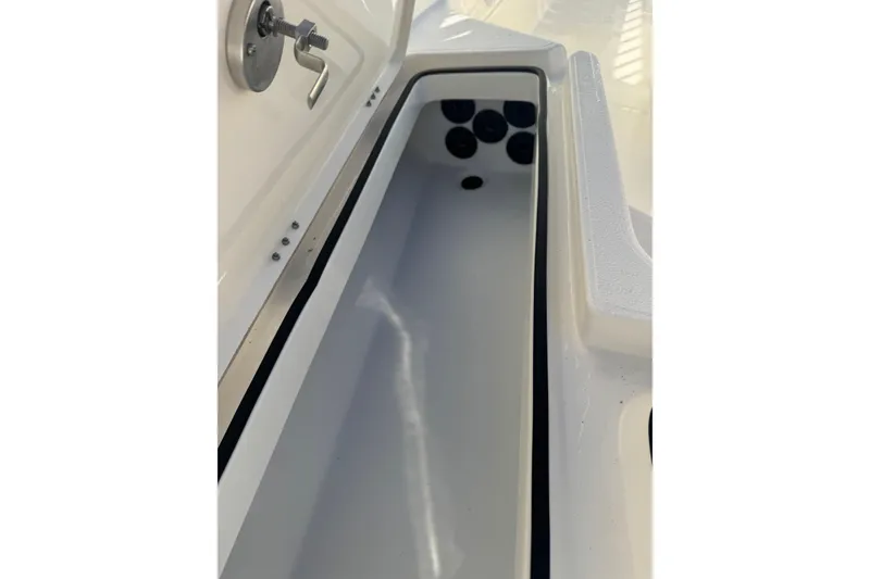 Slide: The Image of Interior view of 2026 Skeeter SX221 boat compartment, showcasing storage space and design. - 20