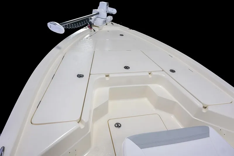 Slide: The Image of Manufacturer Provided Image: 2026 Skeeter SX221 boat deck with storage compartments and trolling motor. - 3