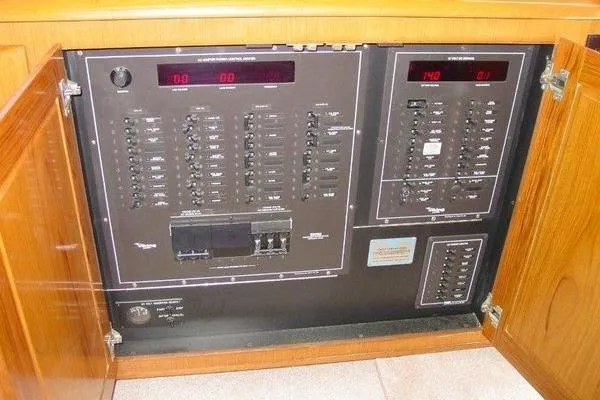 Slide: The Image of Helm of 1996 Viking 50 Convertible yacht with marina view. - 7