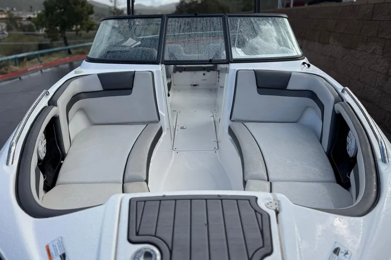 Slide: The Image of 2018 Yamaha Boats AR240 interior with sleek seating and modern design. - 10
