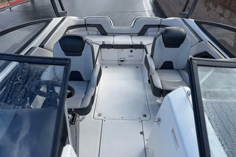 Slide: The Image of 2018 Yamaha Boats AR240 interior with sleek seating and modern design. - 16
