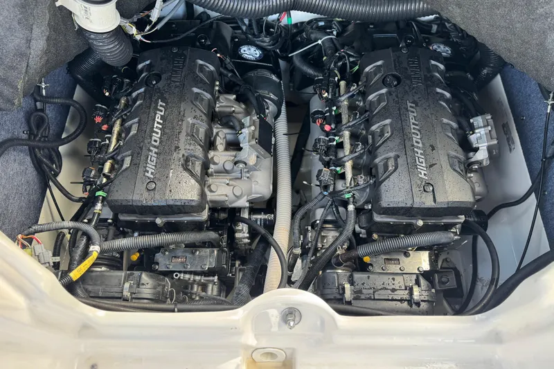 Slide: The Image of 2018 Yamaha Boats AR240 high-output engines in a clean engine compartment. - 19