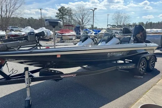 Slide: The Image of 2022 Phoenix 721 ProXP boat on trailer in outdoor lot, sunny day. - 4