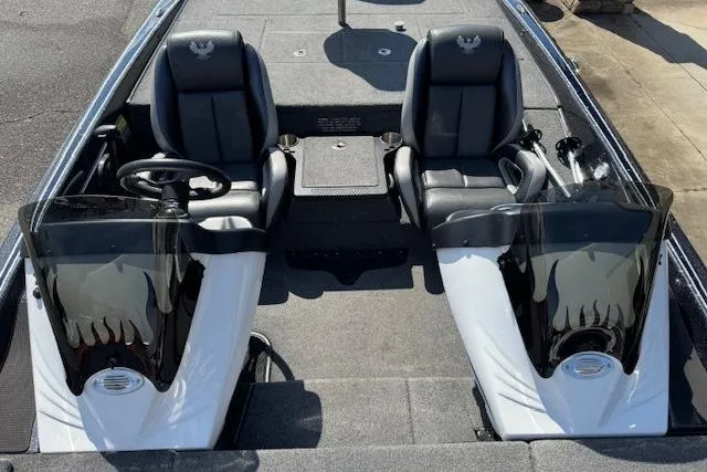 Slide: The Image of 2022 Phoenix 721 ProXP boat interior with dual seats and steering consoles. - 9