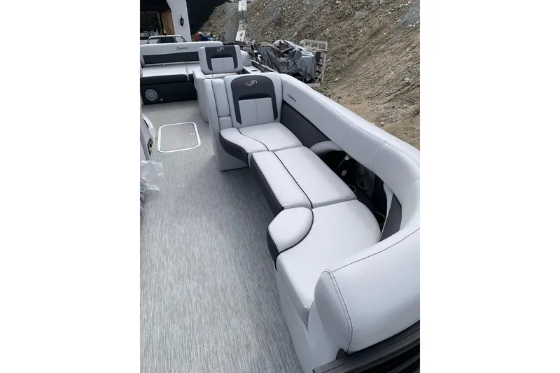Slide: The Image of 2022 Barletta Corsa 25U boat interior with luxurious seating and modern design. - 5