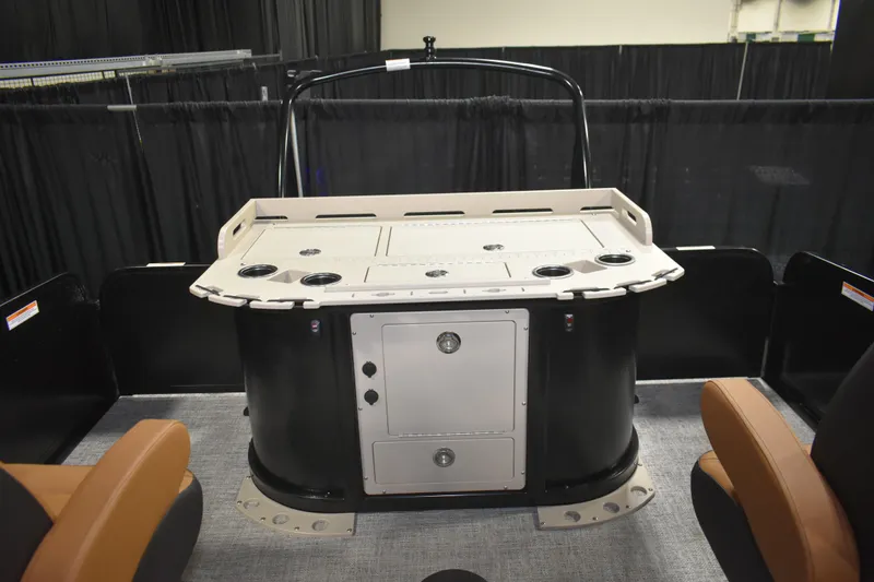 Slide: The Image of 2026 Premier 230 Sunsation Angler 2pt boat interior with fishing station and seating. - 18