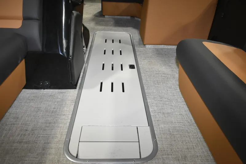 Slide: The Image of Interior of 2026 Premier 230 Sunsation Angler 2pt boat, featuring sleek seating and flooring. - 22