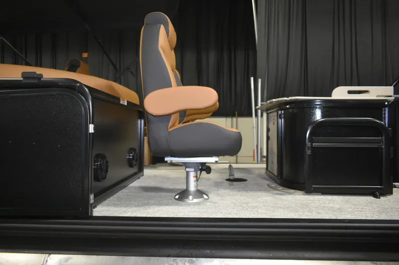 Slide: The Image of 2026 Premier 230 Sunsation Angler 2pt boat interior with seating and console. - 5