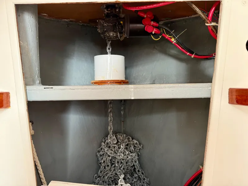 Slide: The Image of Anchor chain storage in 1978 Dyer 29 Trunk Cabin boat. - 25