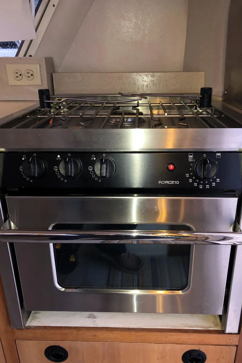 Slide: The Image of Stainless steel stove and oven in 2000 Albin 35 Tournament Express boat. - 15