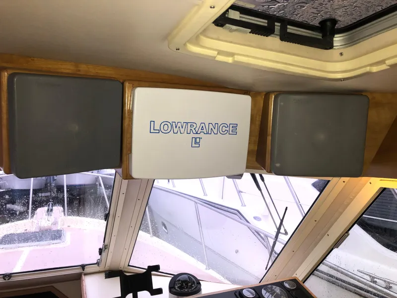Slide: The Image of Interior of 2000 Albin 35 Tournament Express with Lowrance equipment. - 24