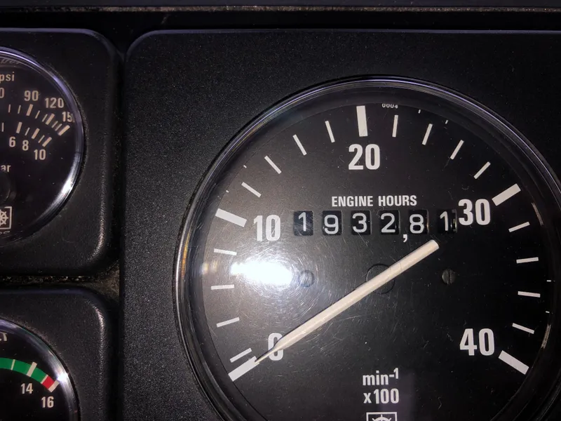 Slide: The Image of Engine hour meter showing 1932.8 hours on 2000 Albin 35 Tournament Express. - 27