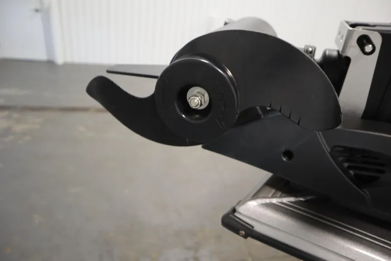 Slide: The Image of Close-up of a 2024 Crestliner 1950 Fish Hawk WT boat propeller in a garage. - 14