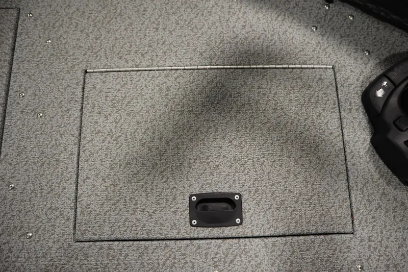 Slide: The Image of 2024 Crestliner 1950 Fish Hawk WT boat floor with storage compartment. - 20