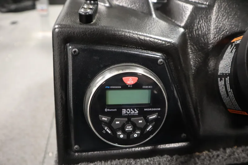 Slide: The Image of Audio system in 2024 Crestliner 1950 Fish Hawk WT boat, featuring Boss MGR350B controls. - 37
