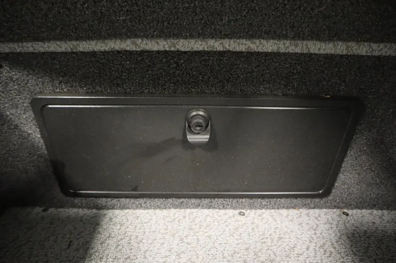 Slide: The Image of 2024 Crestliner 1950 Fish Hawk WT storage compartment with secure latch. - 40