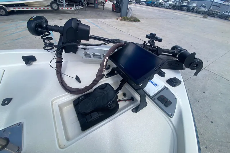 Slide: The Image of 2013 Ranger Z518 Intracoastal boat dashboard with electronic controls and display. - 11