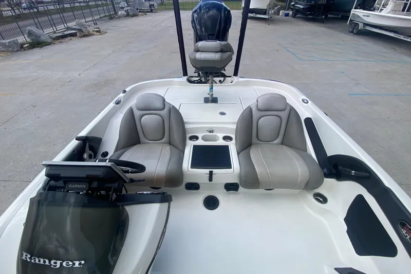 Slide: The Image of 2013 Ranger Z518 Intracoastal boat interior with dual seats and Garmin equipment. - 15